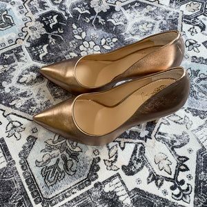 A pair of rose metallic Napa, Vince Camuto heels